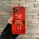 Чехол для iPhone 12 Pro медвежонок Bearbrick Mars Красно-оранжевый